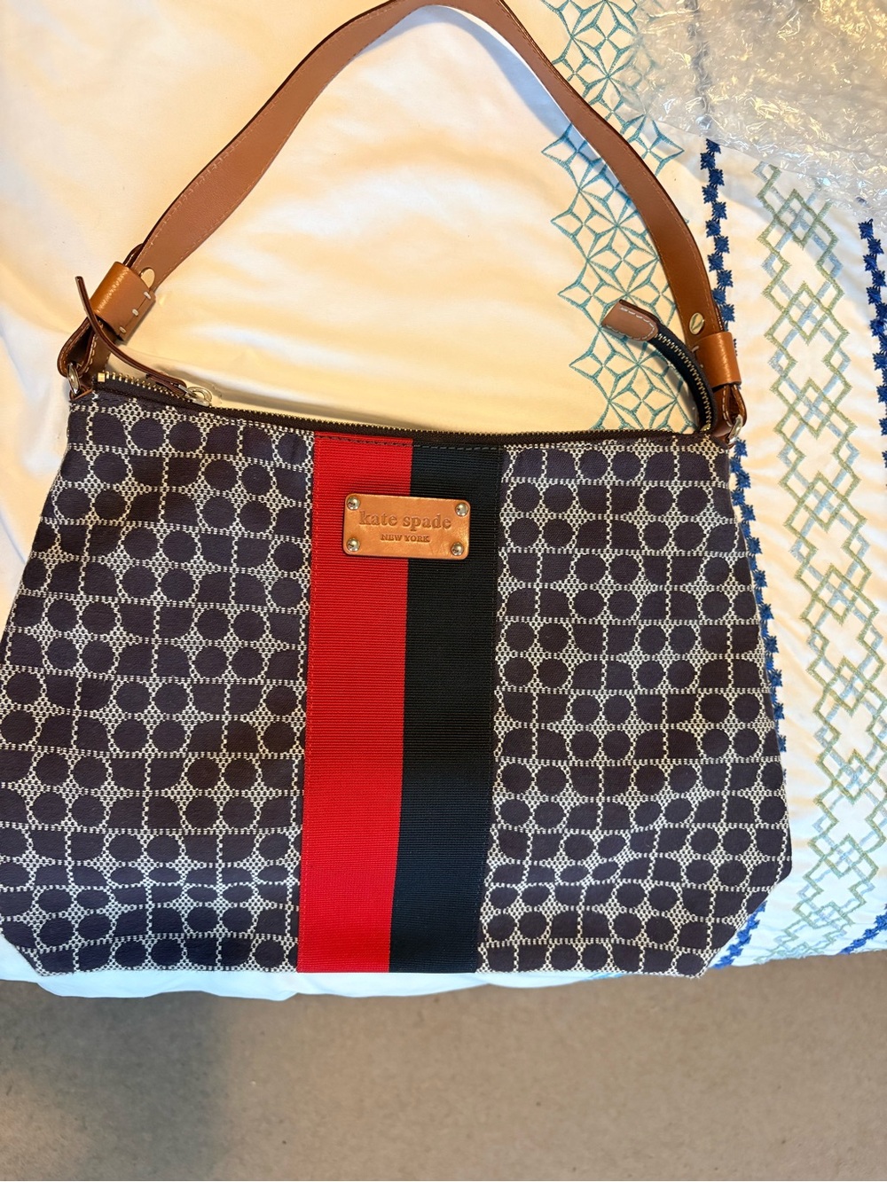kate spade black patterned shoulder bag with red and black center stripe